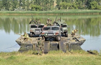 National Army Service Members Conduct Tactical Exercise