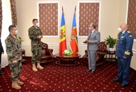 Three ambassadors accredited in Chisinau were decorated by the Minister of Defense Alexandru Pinzari with the medal 